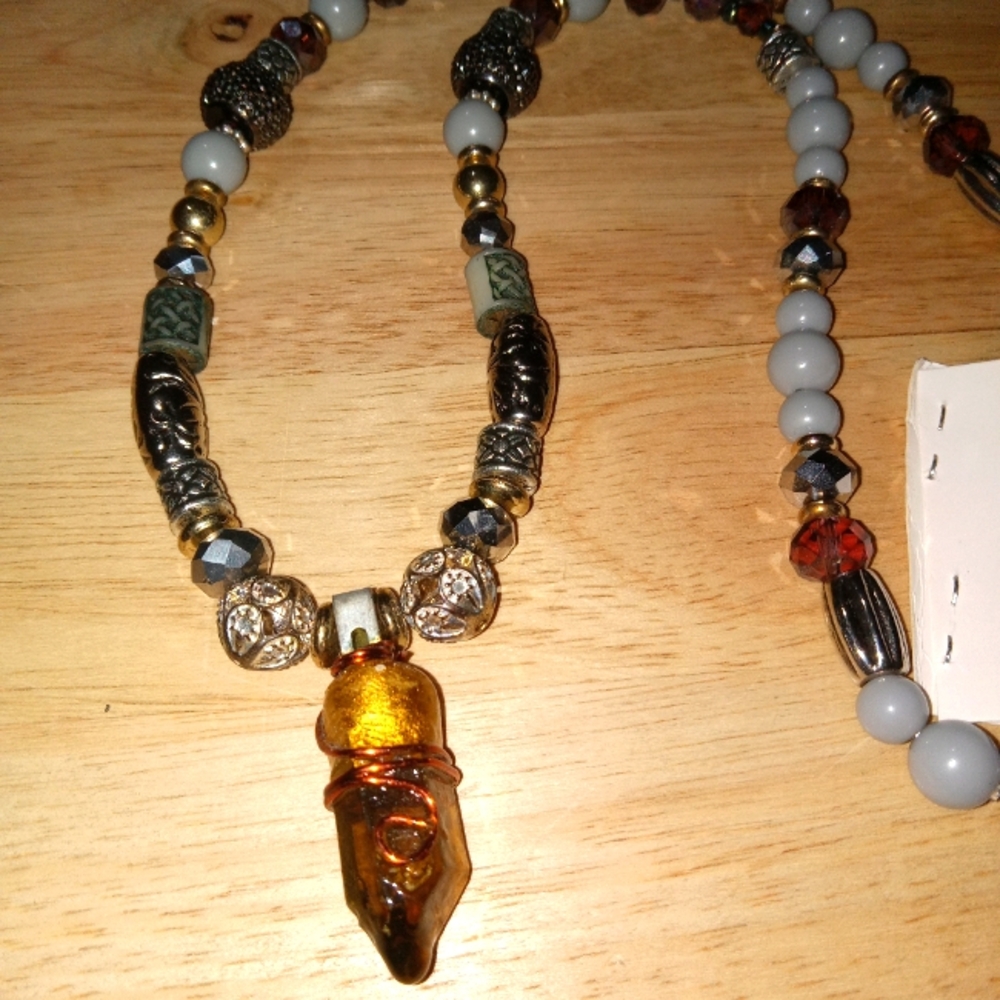 Quartz crystal emblem necklace